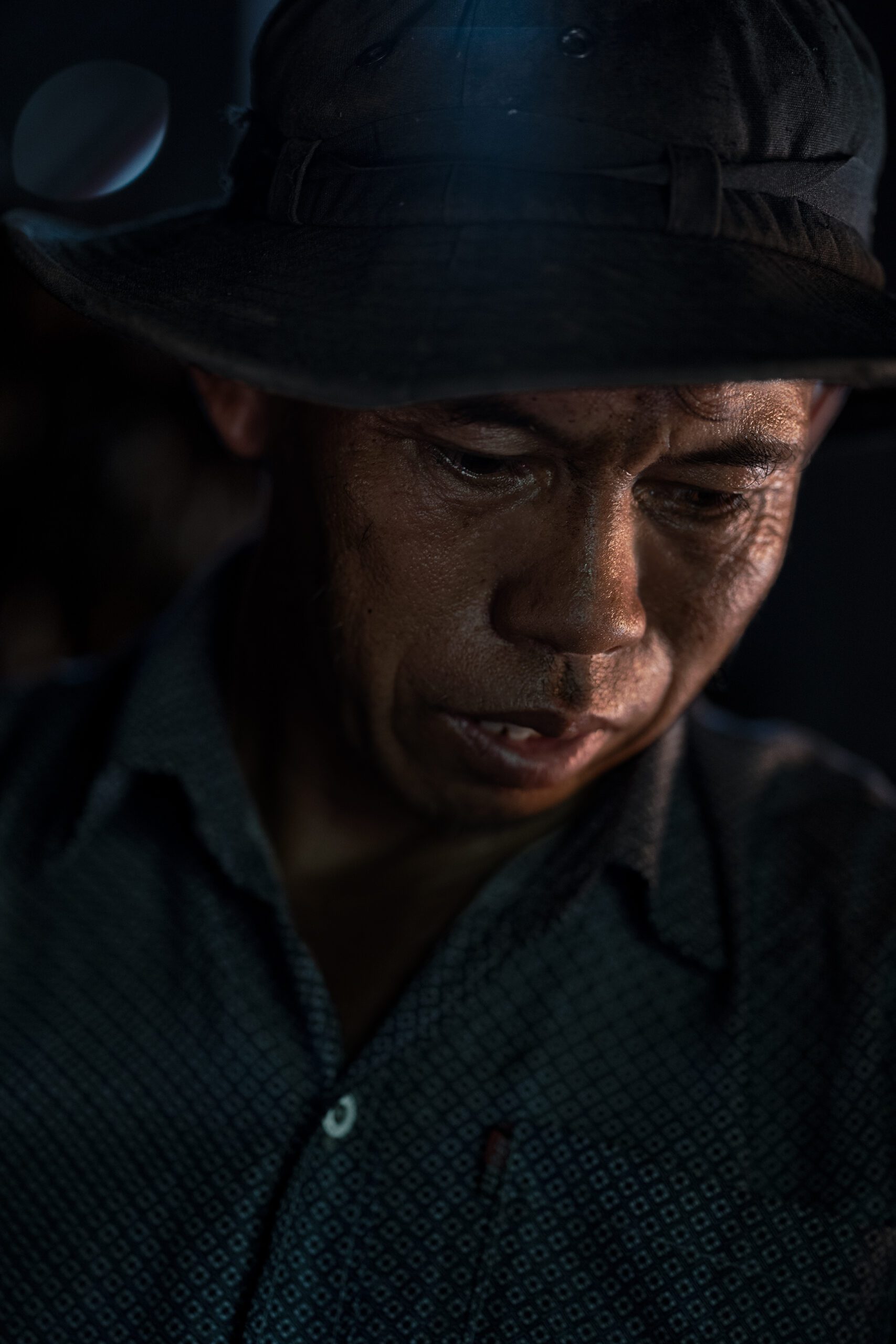 Pov Working in his Fish Smokehouse, Kompong Khleang, Cambodia